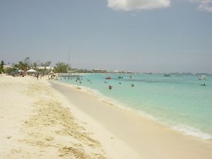 (Above: Seven Mile Beach, a major tourist attraction in the Caymans)